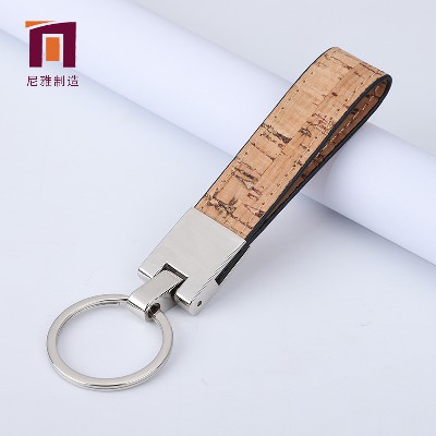 Imitation wood grain leather decoration metal keychain logo creative automotive accessories gift keychain processing wholesale