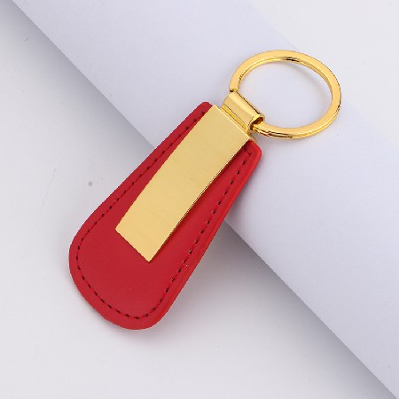 Wholesale metal leather keychains for men and women's bags, hanging accessories, car hanging accessories, small gifts, creative keychains for companies