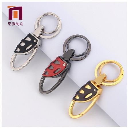 Wholesale of double ring metal keychain leather buckle for men's waist hanging keychain creative car keychain by manufacturers